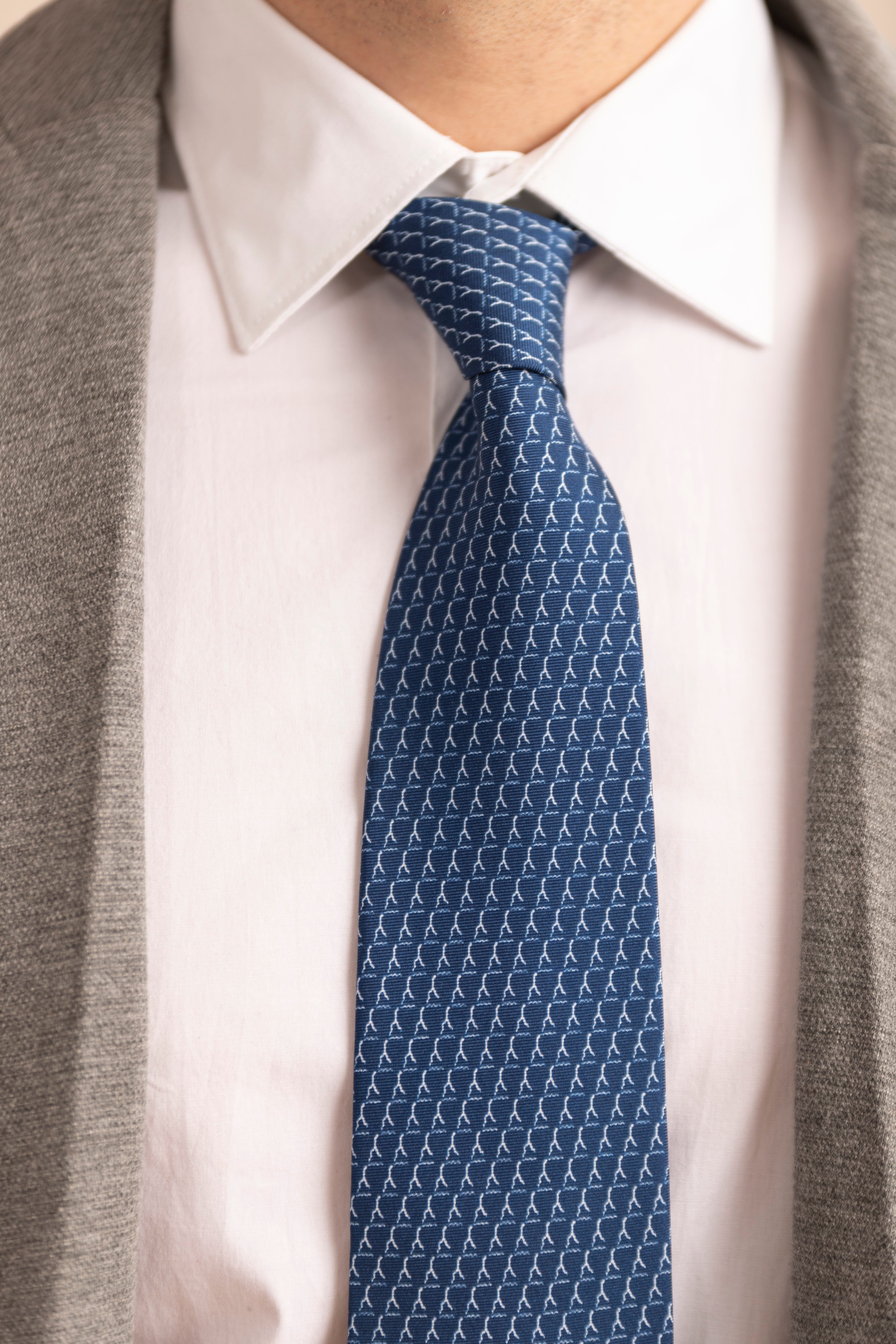 Pure Silk Tie | Blue with White Logo & Colorful Tail