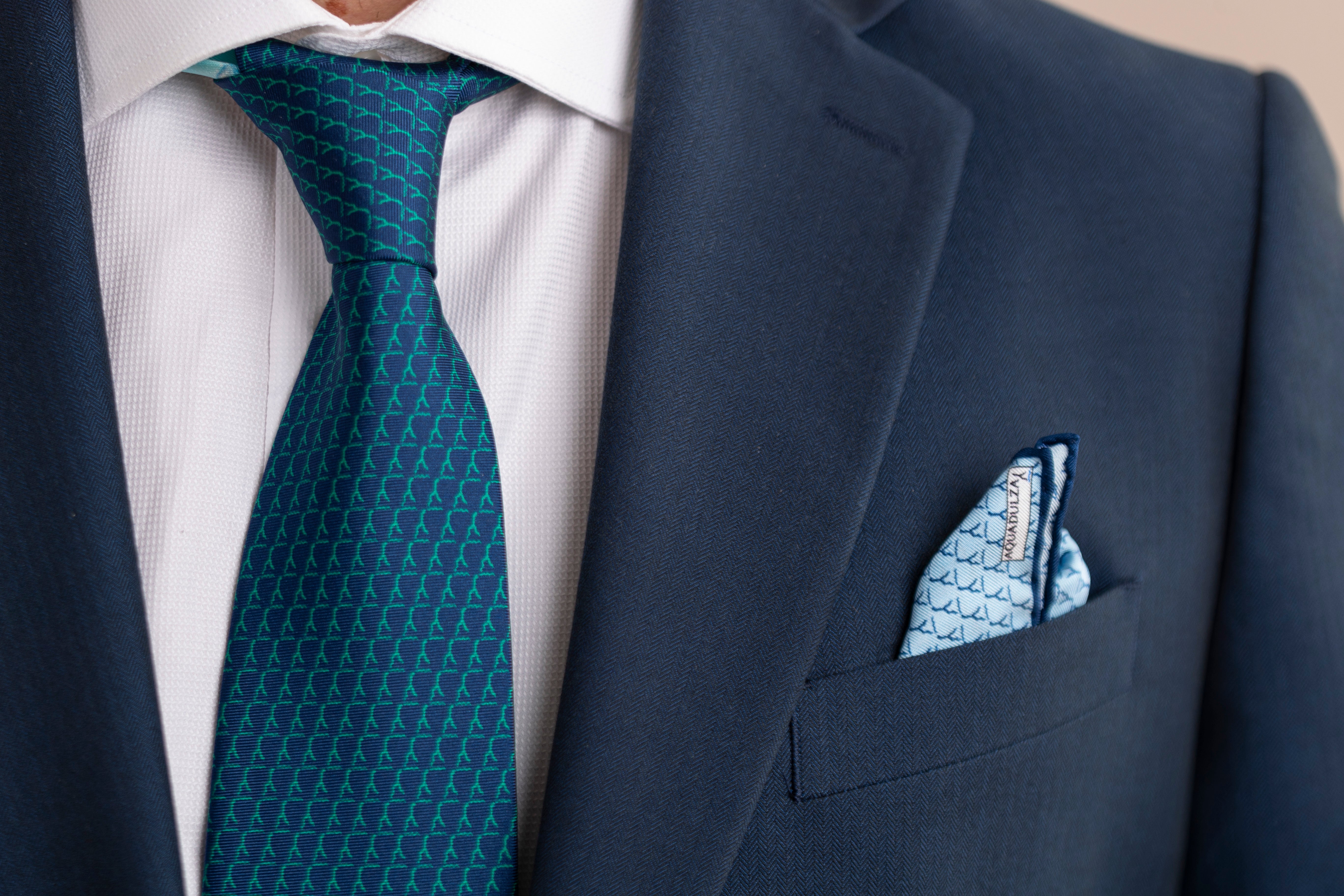 Pure Silk Tie | Blue with Green Logo